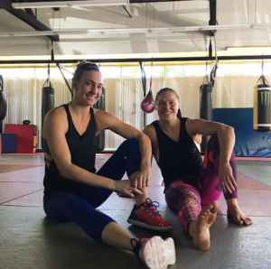 a photo of Ronda Rousey and Mikaela Mayer